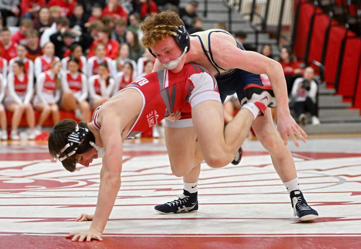 Bald Eagle Area’s Dawson Lomison controls Bellefonte’s Cameron Garcia in the 127 lb bout of the match on Tuesday, Jan. 23, 2024.