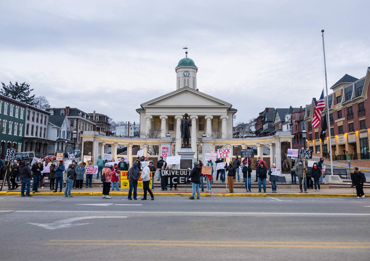 Community members protest in front of the Centre County Courthouse in Bellefonte on March 18, in response to an ICE arrest that took place that month.