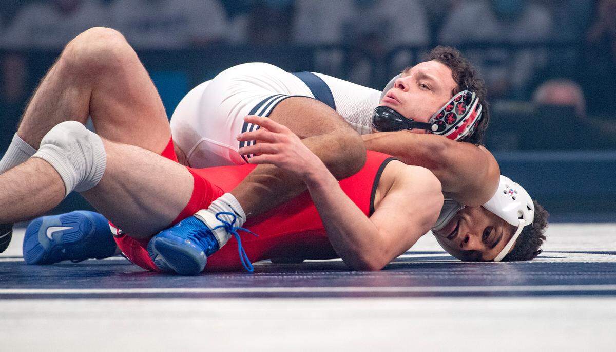 Penn State’s Roman Bravo-Young pulls down Ohio State’s Brady Koontz in the 133 lb bout of the match on Friday, Feb. 4, 2022. Bravo-Young won by fall.