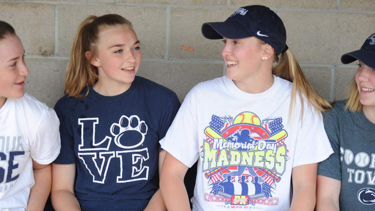 Penns Valley’s quartet of contributing underclassmen talk in the dugout after posing for photos after practice Friday at the high school. From left, they are Avelyn Van Heyst, Kailen Winkelblech, Kendra Bumgardner and Allison O’Brien.