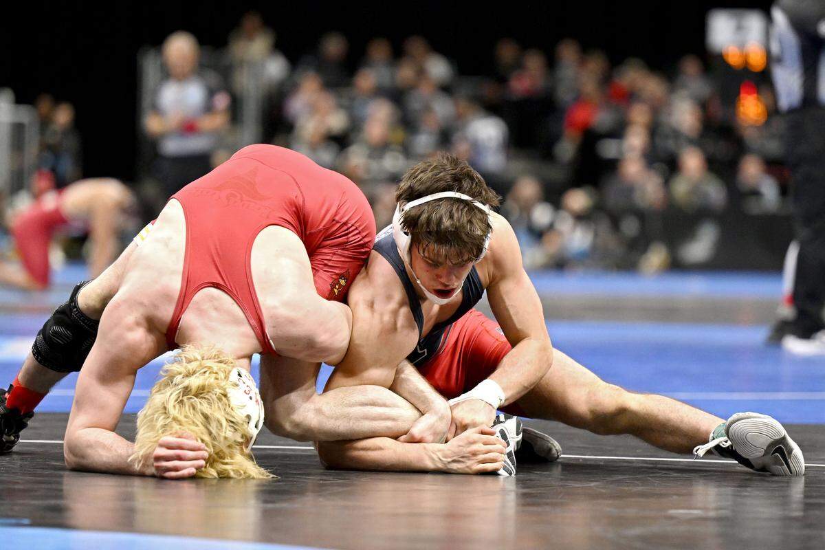Penn’s Jude Swisher wrestles Vinny Zerban in a 157-pound bout at the NCAA wrestling championships on Friday, March 20, 2026.
