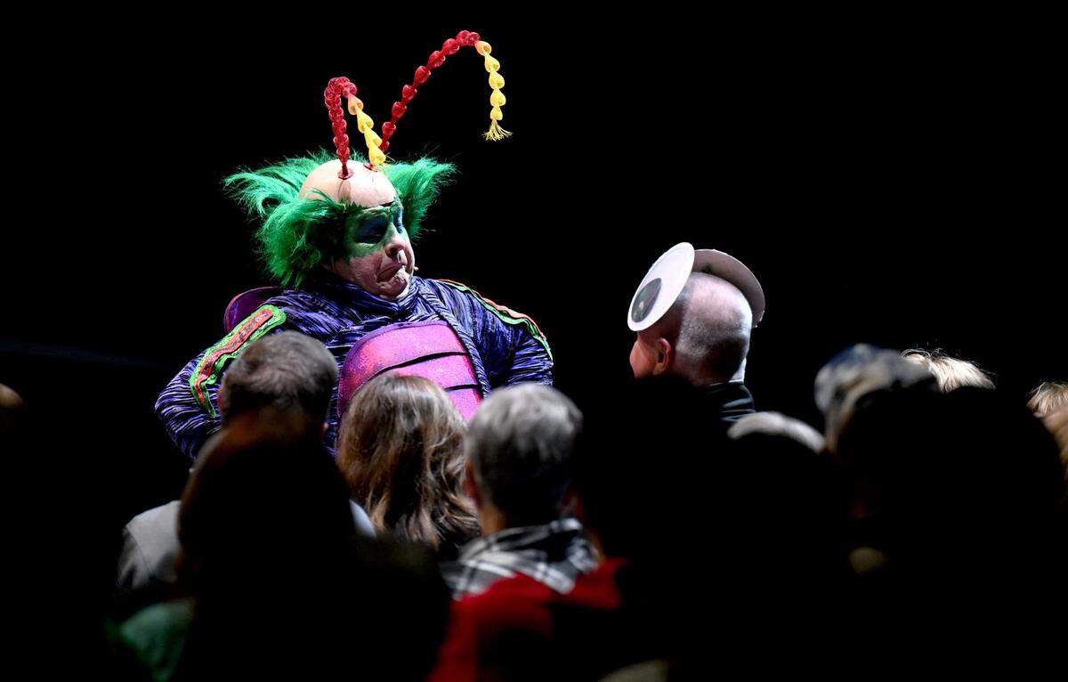 Master Flipo puts giant eyes on an audience member during a performance of Cirque du Soleil’s show "Ovo" at the Bryce Jordan Center on Thursday, March 27, 2025.