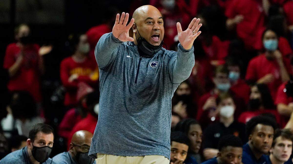 Penn State head coach Micah Shrewsberry talks to his team during the first half of a game against Maryland, Monday, Feb. 21, 2022, in College Park, Md.