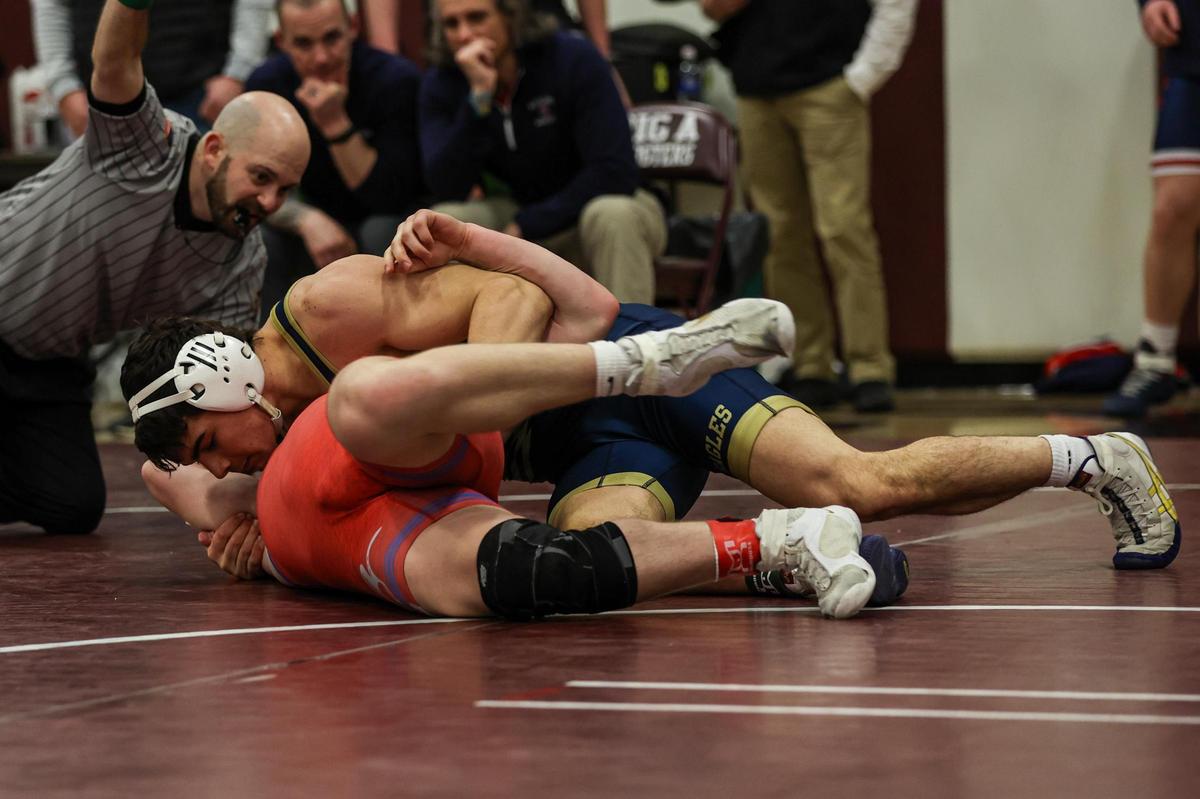 Bald Eagle Area’s Caleb Close tallies nearfall points on Richland’s Grayson Mahla in their 189-pound quarterfinals match of the PIAA Class 2A Southwest Regional on Friday in Altoona. Close pinned Mahla in 1:29.