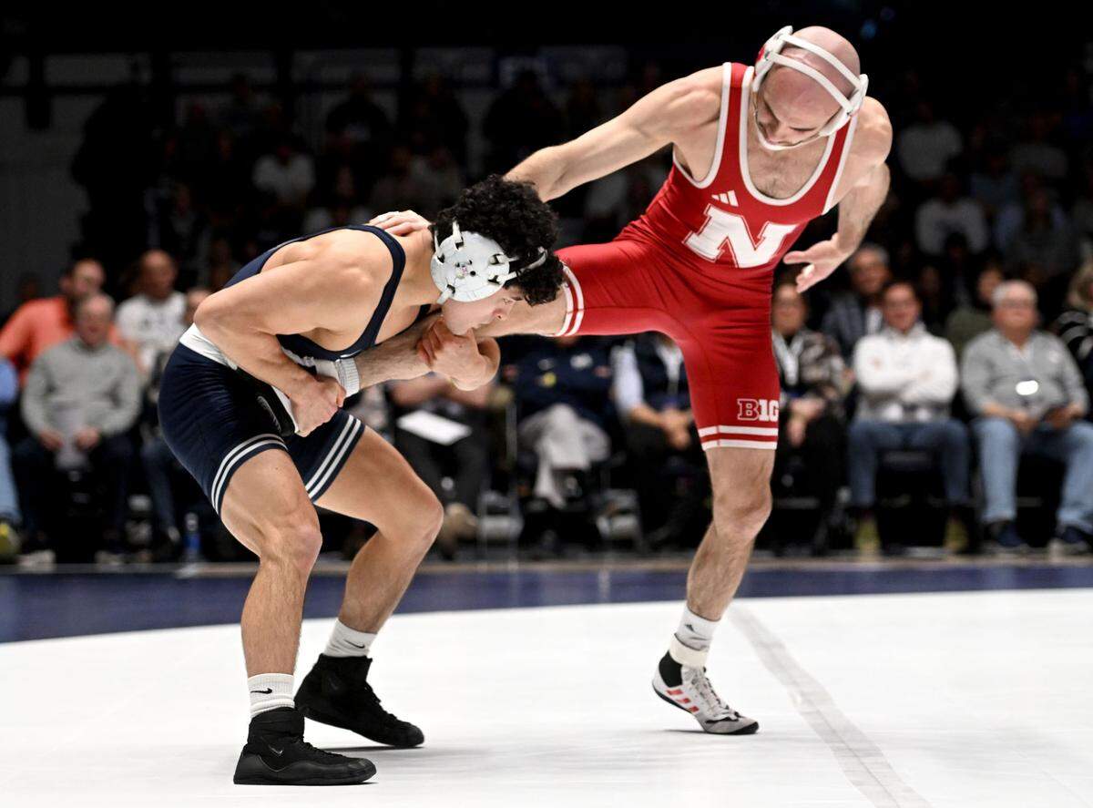 Penn State’s Beau Bartlett pulls in Nebraska’s Brock Hardy in the 141 lb bout of the match on Sunday, Feb. 18, 2024 in Rec Hall.