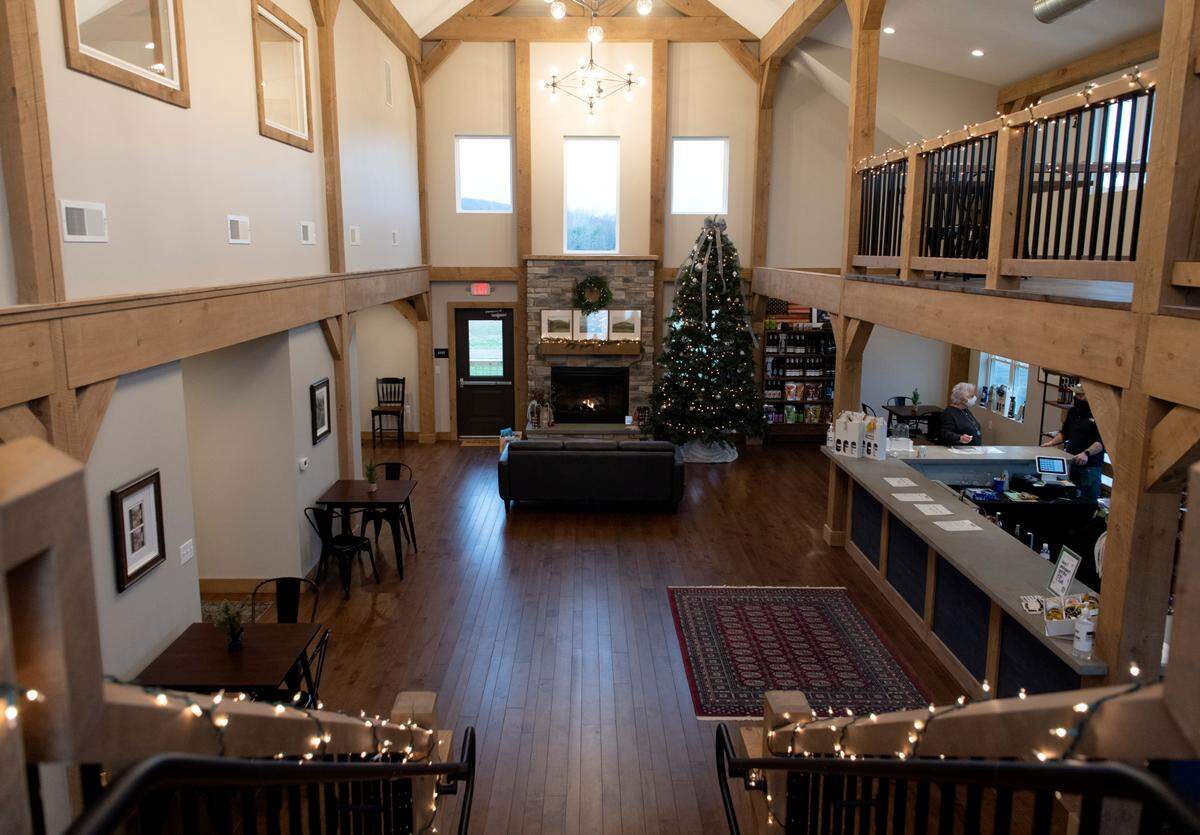 The new home of University Wine Company on Misty Hill Drive in Boalsburg has a tasting room, production facility, outdoor seating and several rows of grape vines.