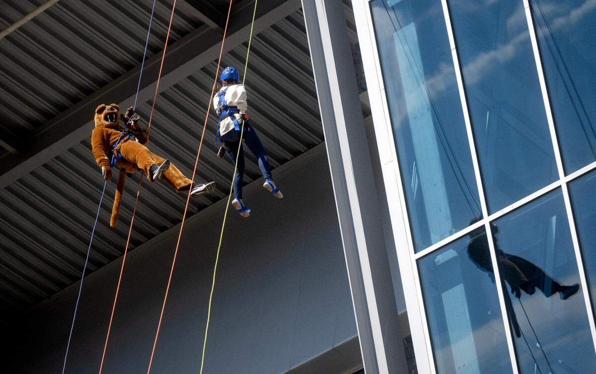 The Nittany Lion rappels off Beaver Stadium as part of the Over the Edge to raise money for the Centre County United Way on Tuesday, Oct. 8, 2024.