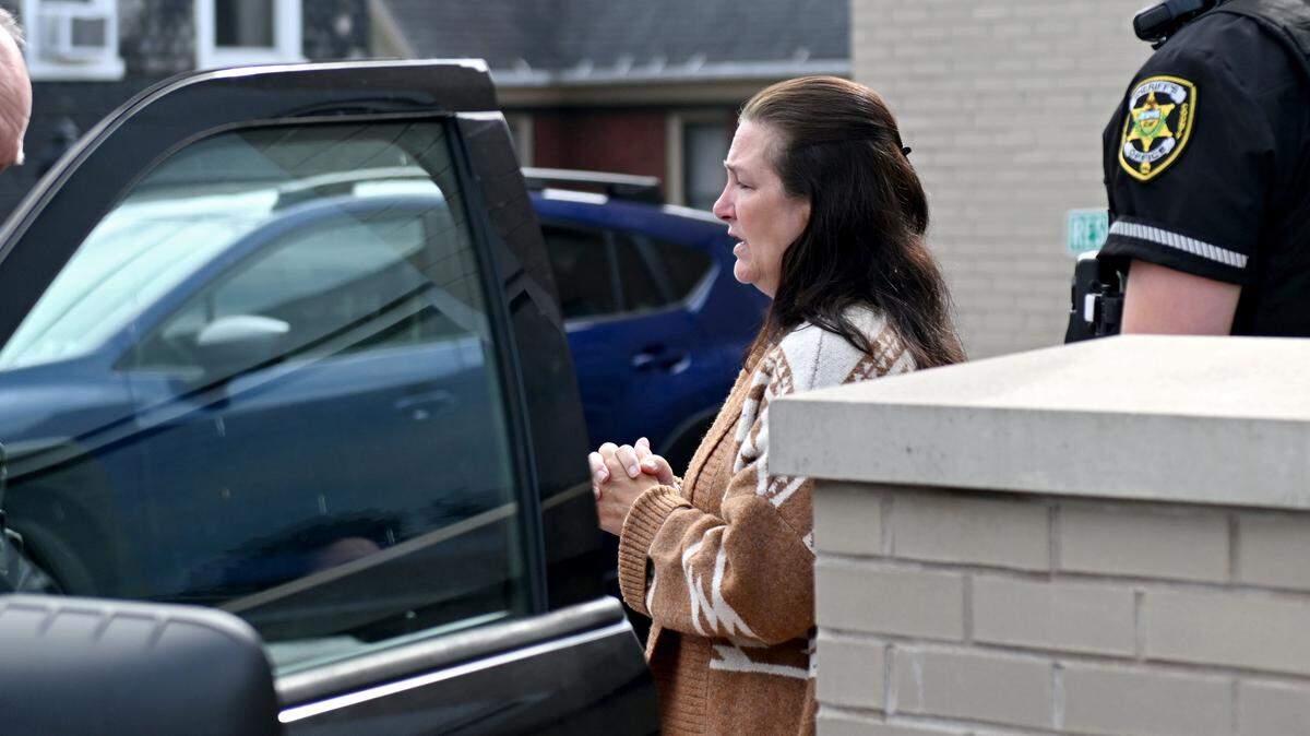 Former Gregg Township secretary and treasurer Pamela Hackenburg is escorted out of the Centre County Courthouse after her sentencing on Tuesday, Sept. 16, 2025.