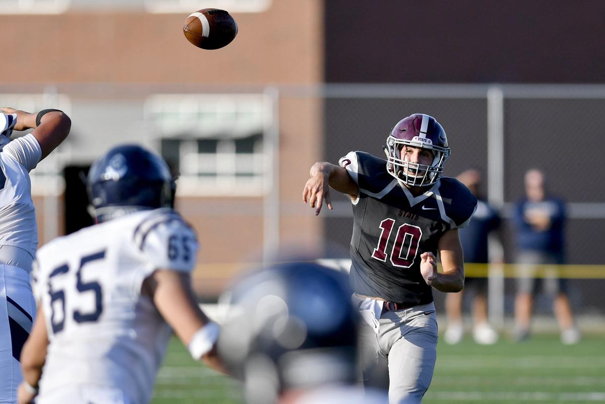 State College’s Brady Dorner makes a pass during the game against St. Augustine on Friday, August 30, 2019 at the South Track Field.