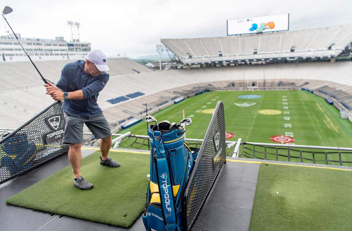 Eric Mellott takes a swing at Topgolf Live at Beaver Stadium on Thursday, June 2, 2022.