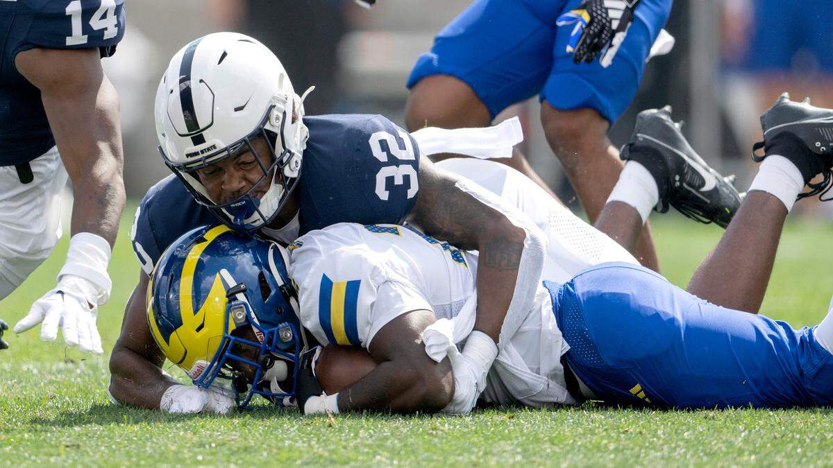Penn State linebacker Keon Wylie tackles Delaware’s ball carrier during the game on Saturday, Sept. 9, 2023.