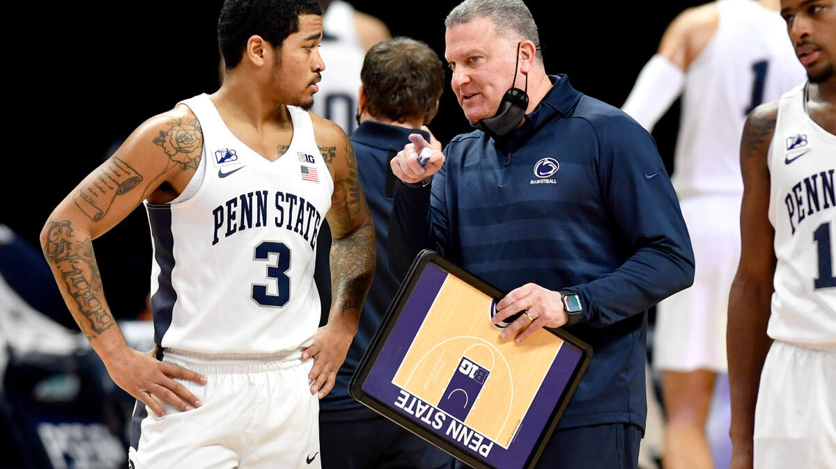 Penn State’s Sam Sessoms listens to interim men’s basketball coach Jim Ferry during the first half of the game against Maryland on Friday, Feb. 5, 2021.