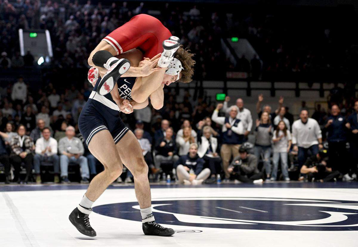 Penn State’s Levi Haines lifts Nebraska’s Peyton Robb to get a takedown in the 157 lb bout of the match on Sunday, Feb. 18, 2024 in Rec Hall.