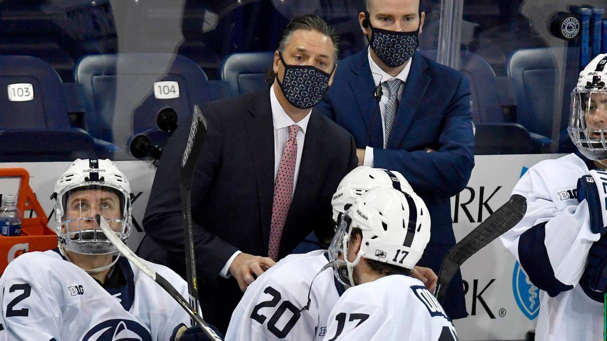Penn State men’s hockey coach Guy Gadowsky talks to his players during the game against Michigan on Thursday, Dec. 3, 2020 at Pegula Ice Arena.