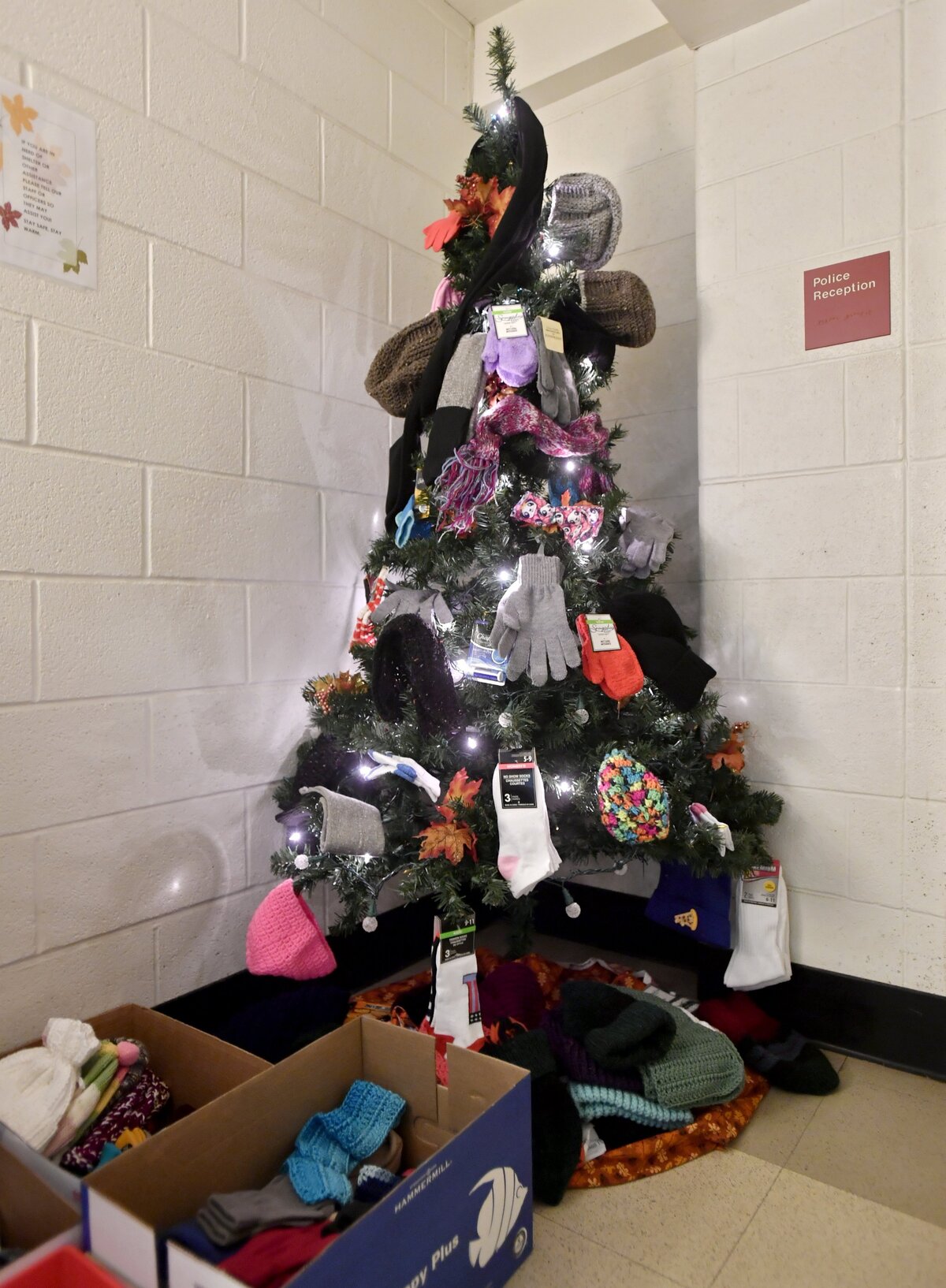 The “warming tree” in the lobby of the Bellefonte Municipal building offers gloves, hats, scarves and more for those in the community who need them.