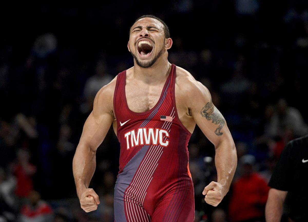 Aaron Brooks celebrates his win over Zahid Valencia in the 86 kg championship bout during the U.S. Olympic Team Trials at the Bryce Jordan Center on April 19, 2024.