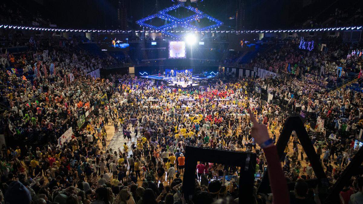 Attendees perform the line dance during the Penn State IFC/Panhellenic Dance Marathon, Thon 2022 Saturday, Feb. 19, 2022 in University Park, Pa. Here’s your guide to this year’s event.