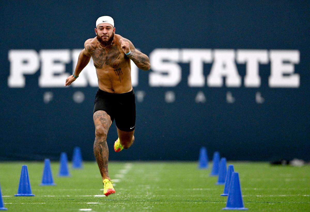 Julian Fleming runs the 40-yard dash during Penn State football’s pro day on Friday, March 28, 2025.