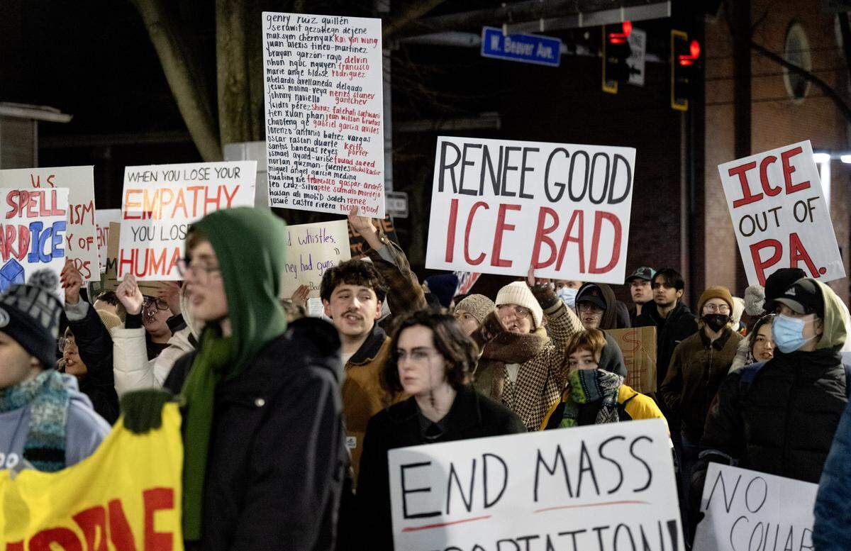 Anti-ICE protesters stop traffic as they march on Beaver Avenue on Monday, Jan. 12, 2026. 