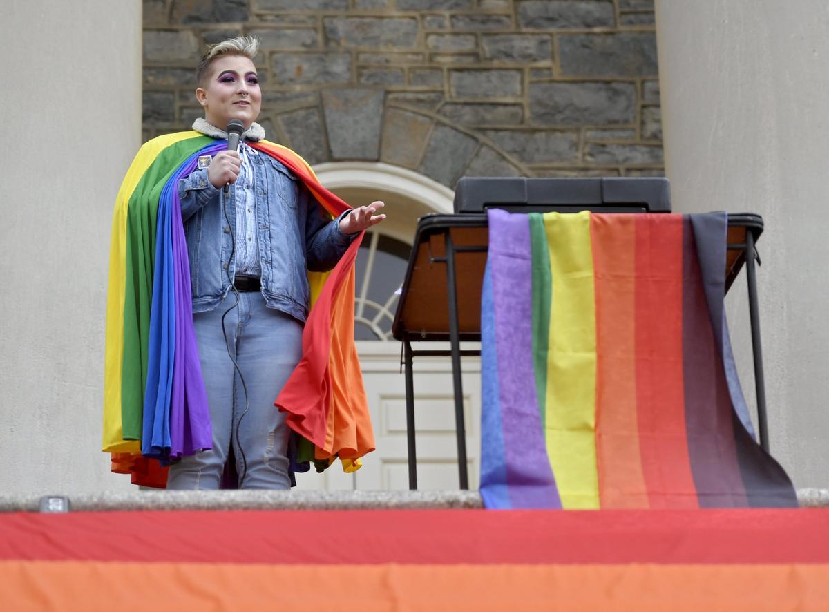 Freshman Colton Lucas speaks during the Penn State LGBTQA Student Resource Center pride march an rally on Friday, April 5, 2019 as part of pride month.