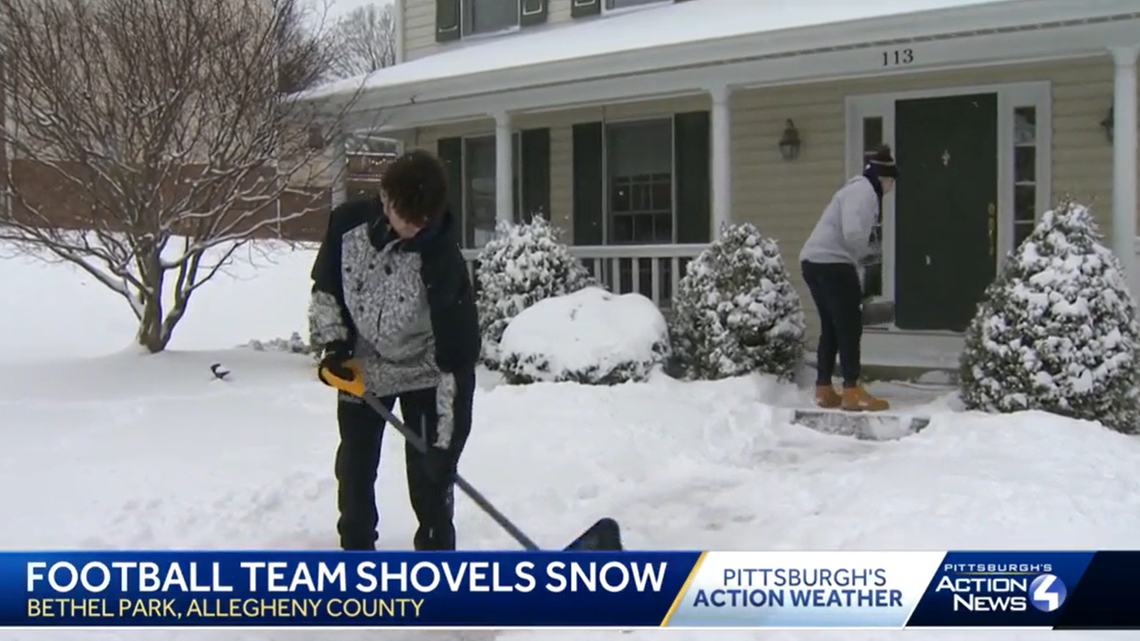 High school football players shovel snow for their “Monday workout” after the Pennsylvania team’s coach canceled a weightlifting workout.