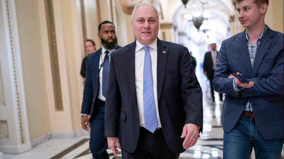 House Minority Whip Steve Scalise, R-La., speaks with a reporter Dec. 23 as he leaves the chamber while lawmakers finalize a $1.7 trillion bill that finances federal agencies and provides aid to Ukraine, at the Capitol in Washington. Scalise is set to become the House majority leader when Republicans take control in the new Congress.