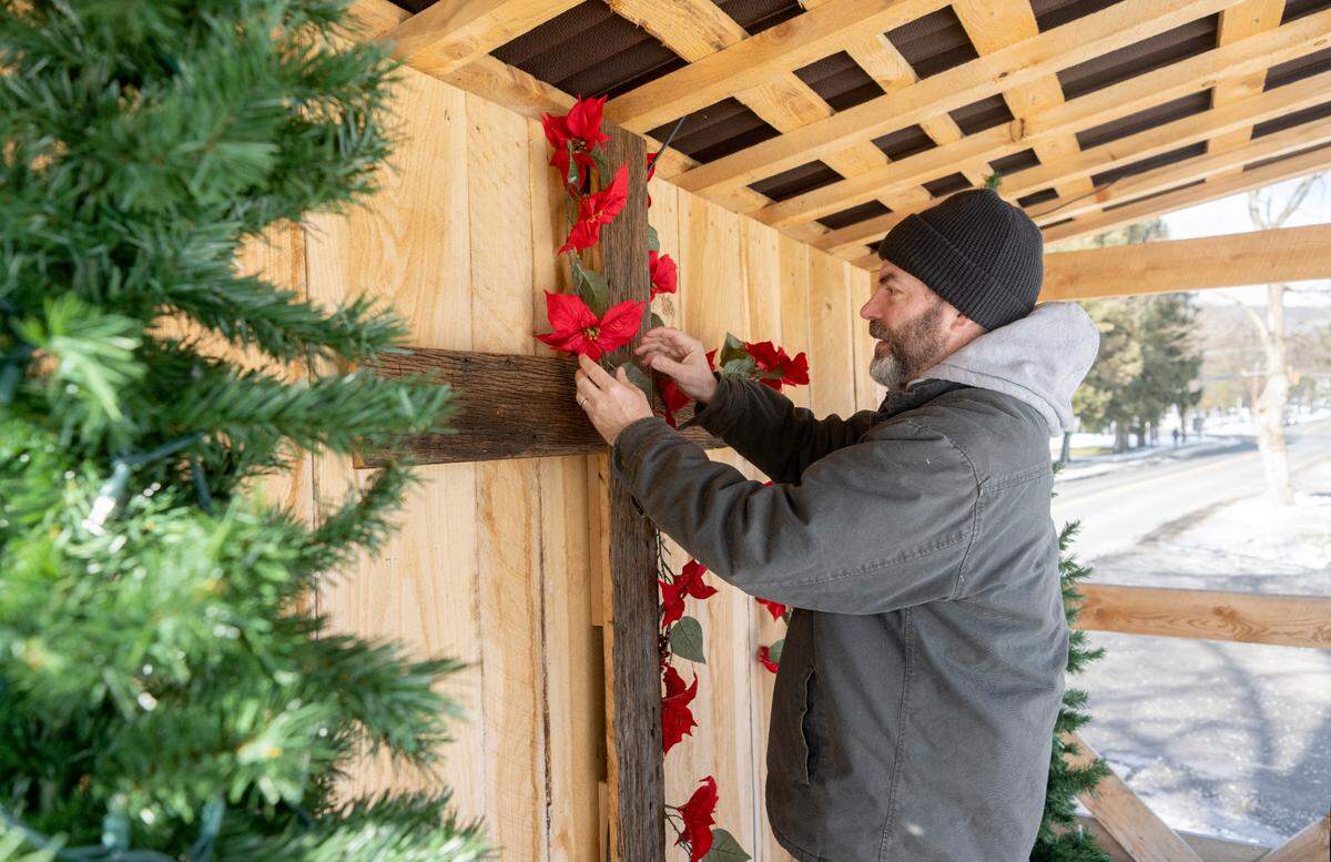 Pastor Brent Book of Zion Lutheran Church in Boalsburg prepares the worship wagon outside of the church for holiday services on Tuesday, Dec. 20 2022.