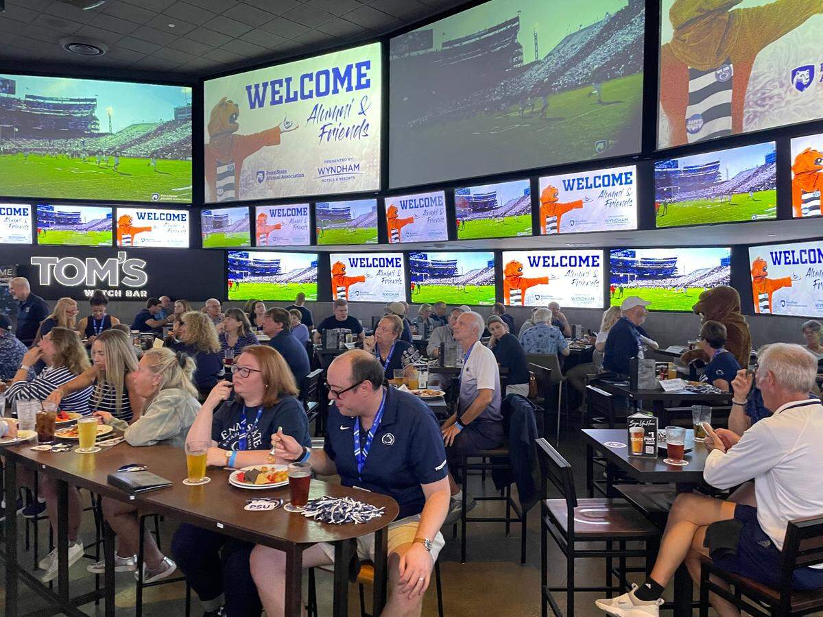 Penn State fans gather Friday at Tom’s Watch Bar in Los Angeles, ahead of the Nittany Lions’ Saturday matchup with USC.