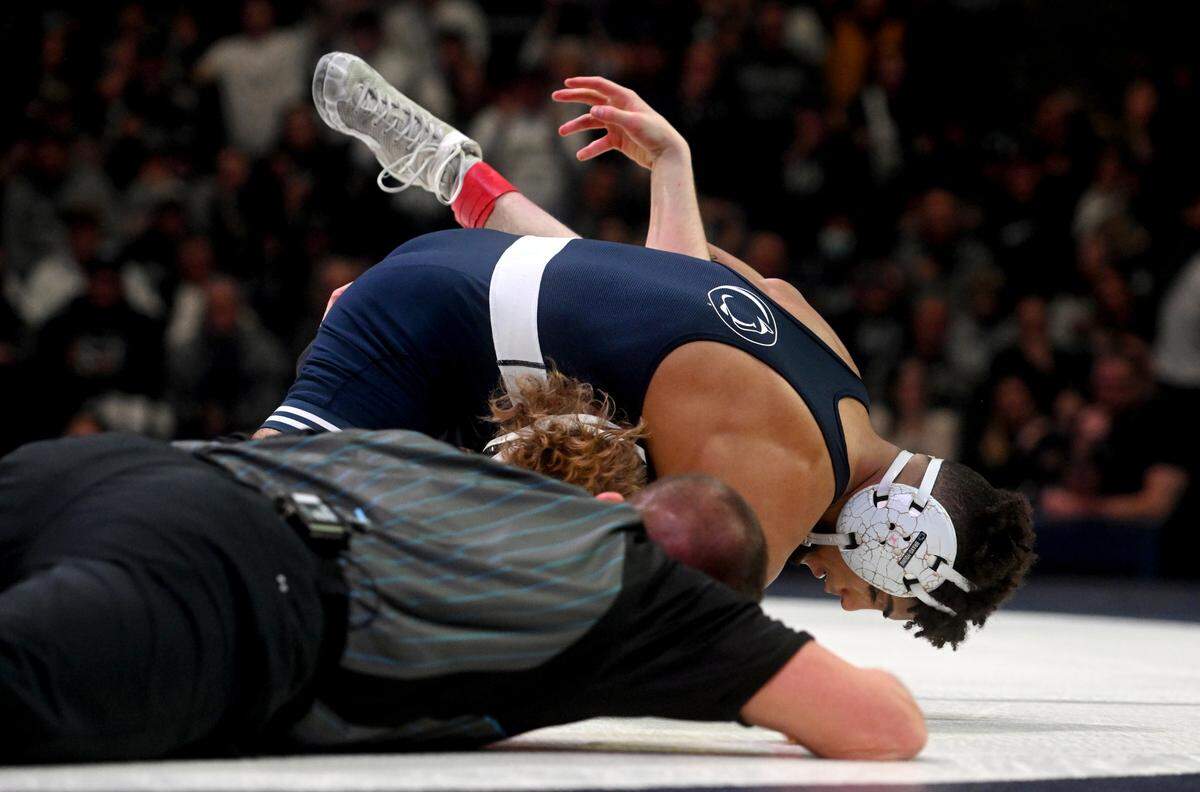 Penn State’s Roman Bravo-Young pins Iowa’s Brody Teske in the 133 lb bout of the match on Friday, Jan. 27, 2023 at the Bryce Jordan Center.