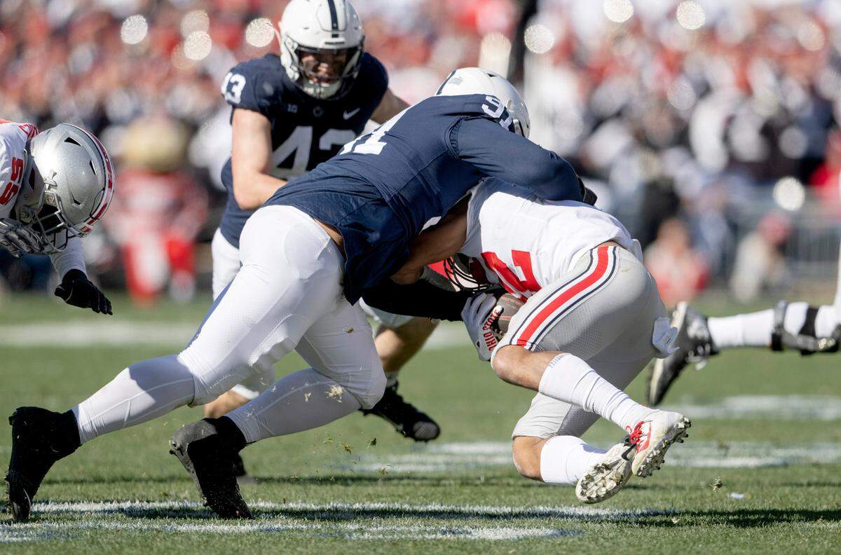Penn State defensive tackle Dvon Ellies tackles Ohio State’s ball carrier during the game on Saturday, Oct. 29, 2022.