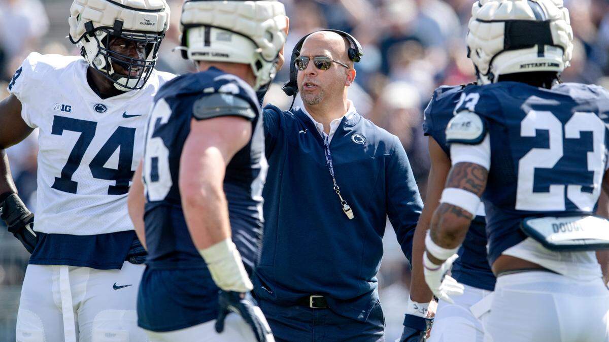 Penn State football coach James Franklin talks to the players between plays of the Blue-White game on Saturday, April 23, 2022.