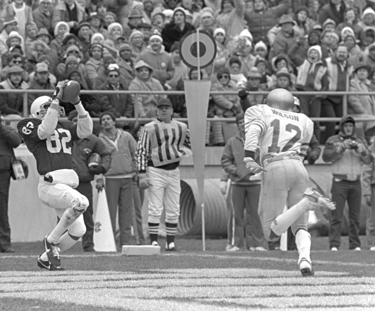 Penn State's Kenny Jackson (#82) and Notre Dame #12 duringthe 34-30 win  against Notre Dame at Beaver Stadium on November 12,1983. Pat Little file  photo.