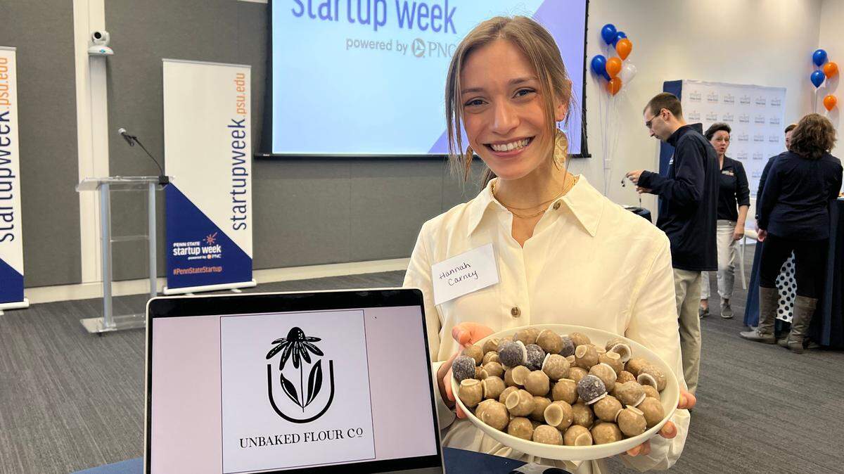 Hannah Carney displays her doughnut holes at the Happy Valley Venture Capitalist Competition.