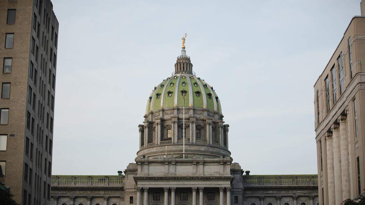 The Pennsylvania State Capitol building in Harrisburg is pictured in July. Pennsylvania lawmakers’ base salary recently rose to more than $106,000.