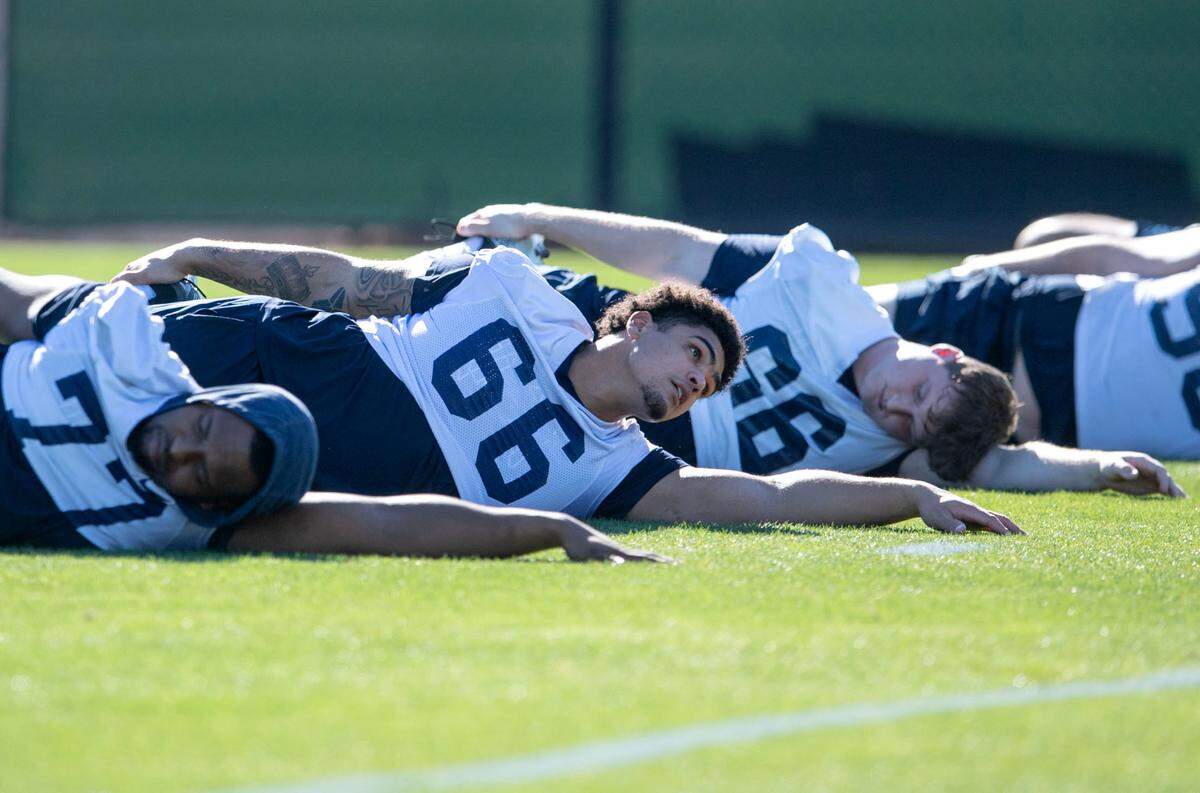 Penn State offensive lineman Drew Shelton stretches at the start of practice for the Fiesta Bowl on Sunday, Dec. 29, 2024 at Tempe Diablo Stadium.