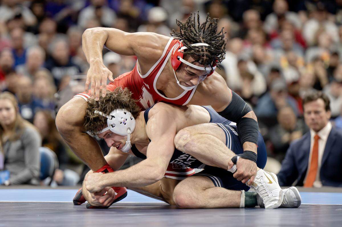Penn State's Levi Haines wrestles Nebraska’s Christopher Minto in the 174-pound championship bout at the NCAA wrestling championships on Saturday, March 21, 2026.