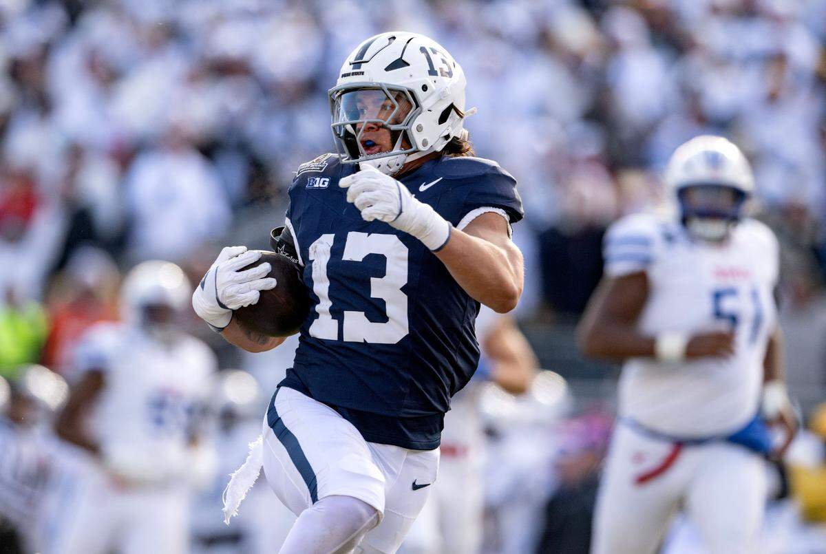 Penn State linebacker Tony Rojas’ cuts down the field with the ball to score a touchdown from his interception during the second quarter of the game against SMU on Saturday, Dec. 21, 2024 at Beaver Stadium.  