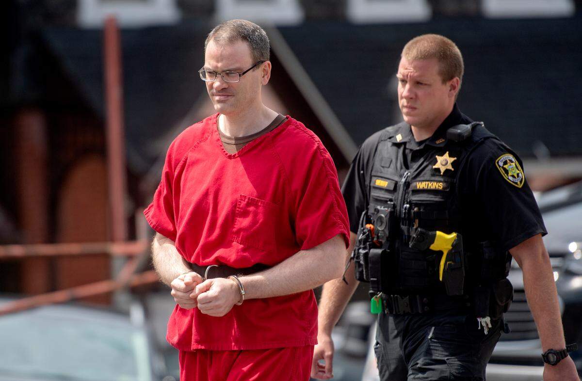 Jeffrey Fields is escorted from the Centre County Courthouse after his sentencing in the rape of 4 Penn State students on Friday, July 8, 2022.