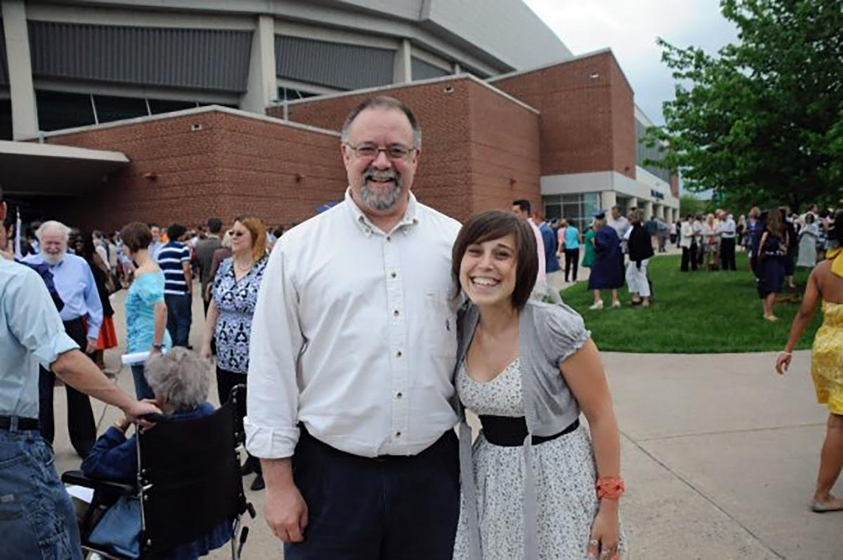Sarah Nathan poses with Penn State professor Curt Chandler after graduation in 2009 at the Bryce Jordan Center.