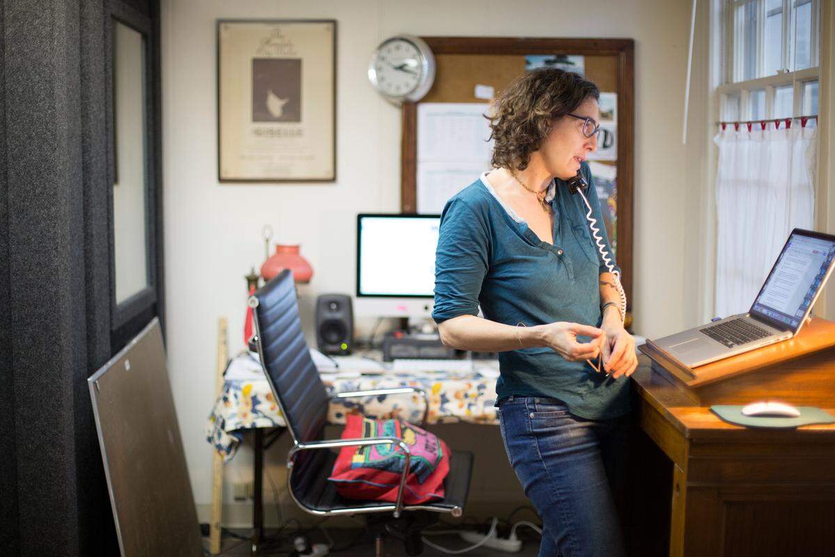 Sarah Koenig works in her office in State College in 2015. Koenig will give a talk at Penn State on Friday about reporting Season 3 of her podcast “Serial,” which explores the effects of the criminal justice system in Cleveland.