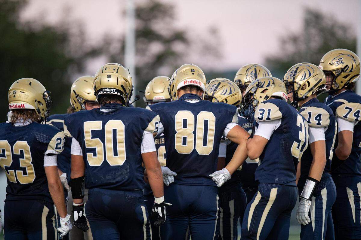 Bald Eagle Area High School’s team huddles during a timeout during Bald Eagle Area High School’s game against Martinsburg Central High School on Friday, Sept. 11, 2020 in Wingate, PA.