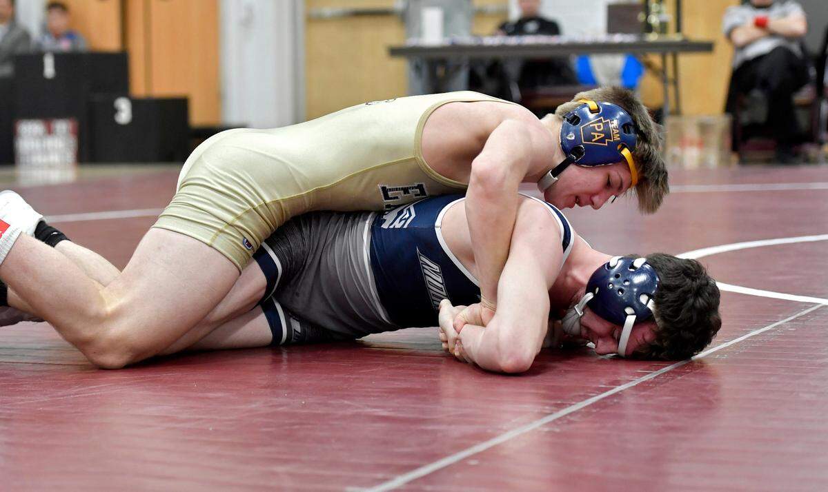 Bald Eagle Area’s Coen Bainey control Philipsburg-Osceola’s Nick Coudriet in the 120 lb championship bout of the District 6 2A tournament on Saturday, Feb. 19, 2022. Bainey won by major decision 9-1.