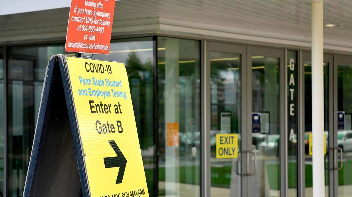 A sign promotes the Penn State COVID-19 asymptomatic testing site at Pegula Ice Arena on Thursday, Aug. 19, 2021.