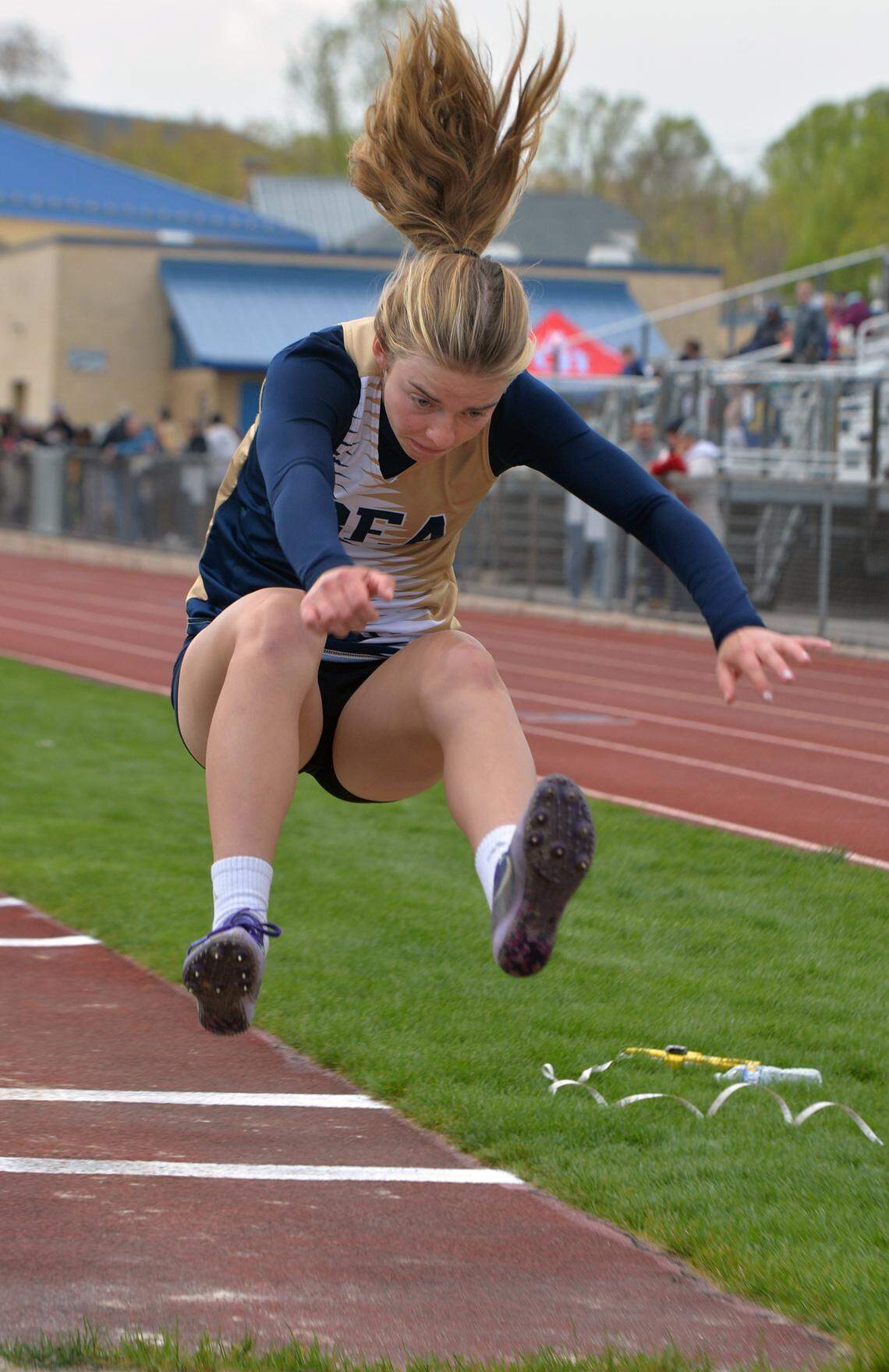 BEA’s Olivia Taylor competes in the long jump event at Bellwood High School Monday during the Bellwood Invitational track meet on Monday, May 1, 2023 .