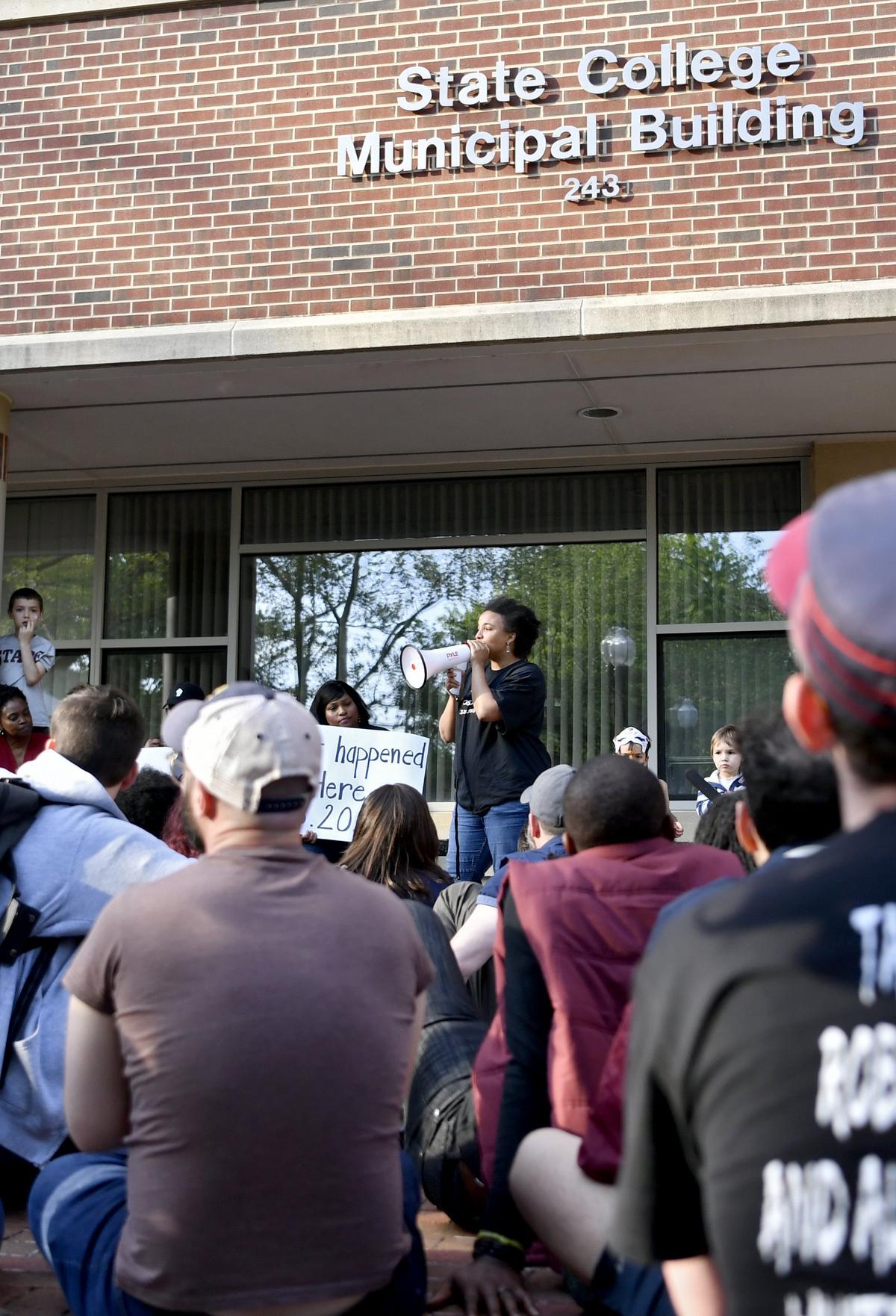 Nanre Nafziger addresses the crowd seeking justice for the death of Osaze Osagie outside of the State College Municipal Building on Wednesday.