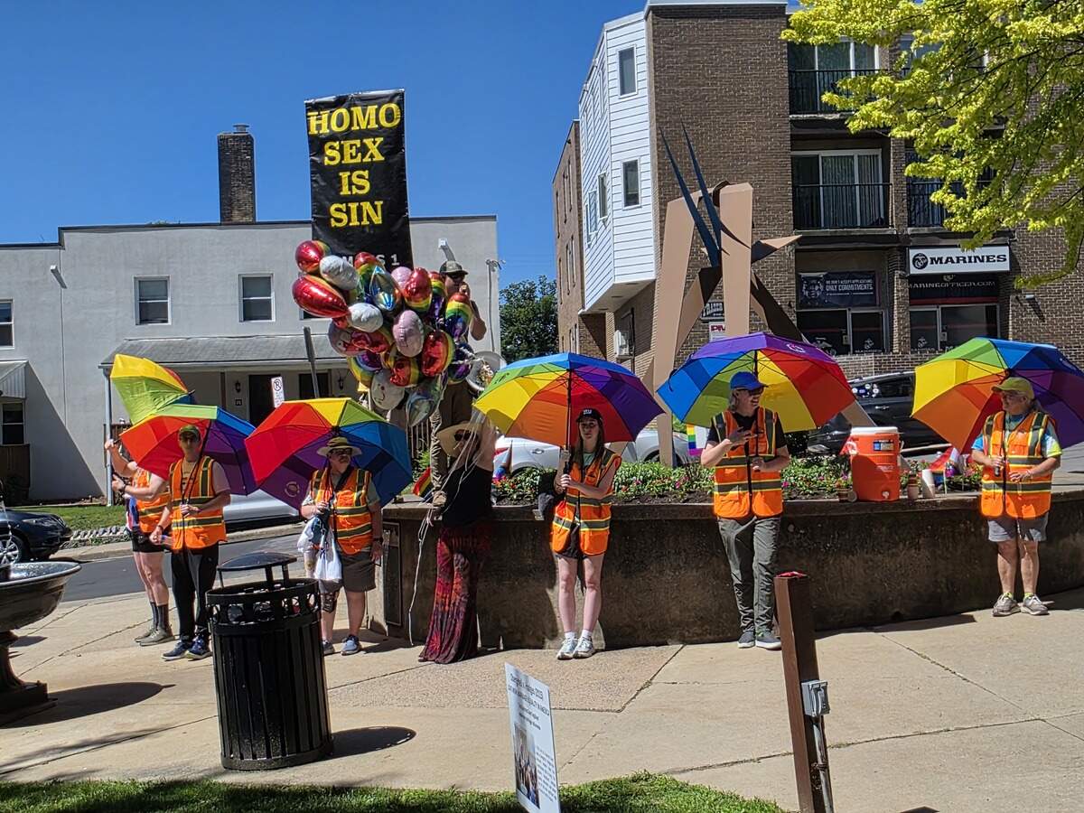 State College Pride volunteers surround protesters at Sidney Friedman Park on Saturday, June 13, 2026.