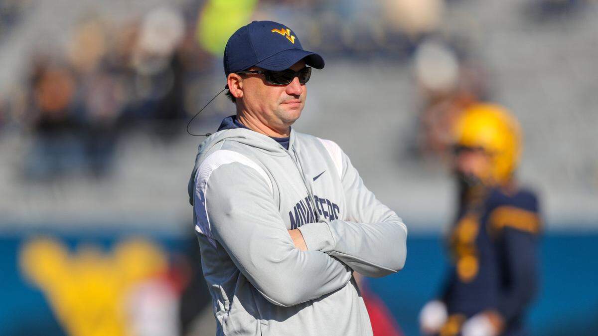 West Virginia Mountaineers head coach Neal Brown during warmups before a November 2022 game against the Kansas State Wildcats at Mountaineer Field at Milan Puskar Stadium.
