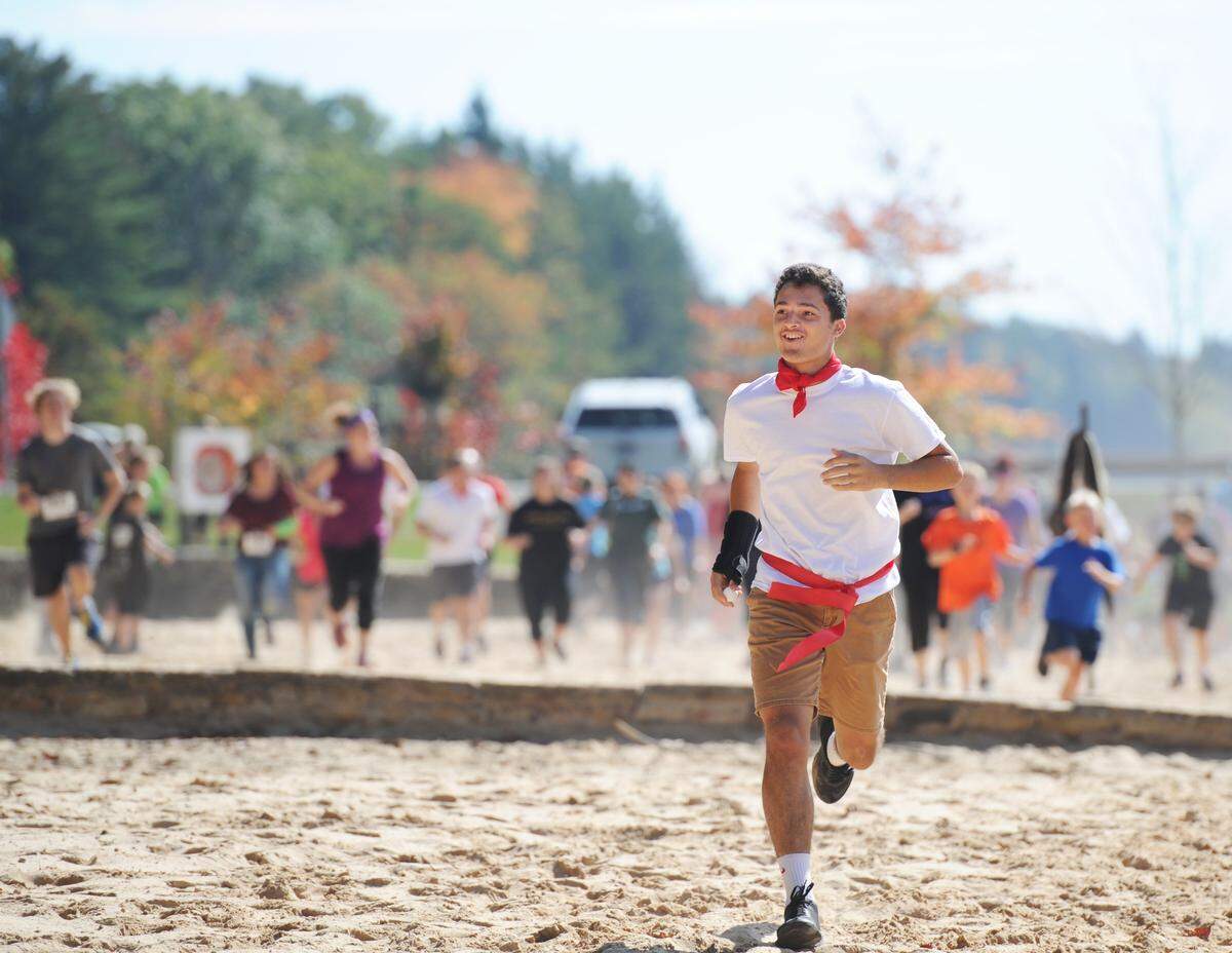 Christopher Warren runs toward the snake pit during the 2017 Monster Hunt Race at Black Moshannon State Park.