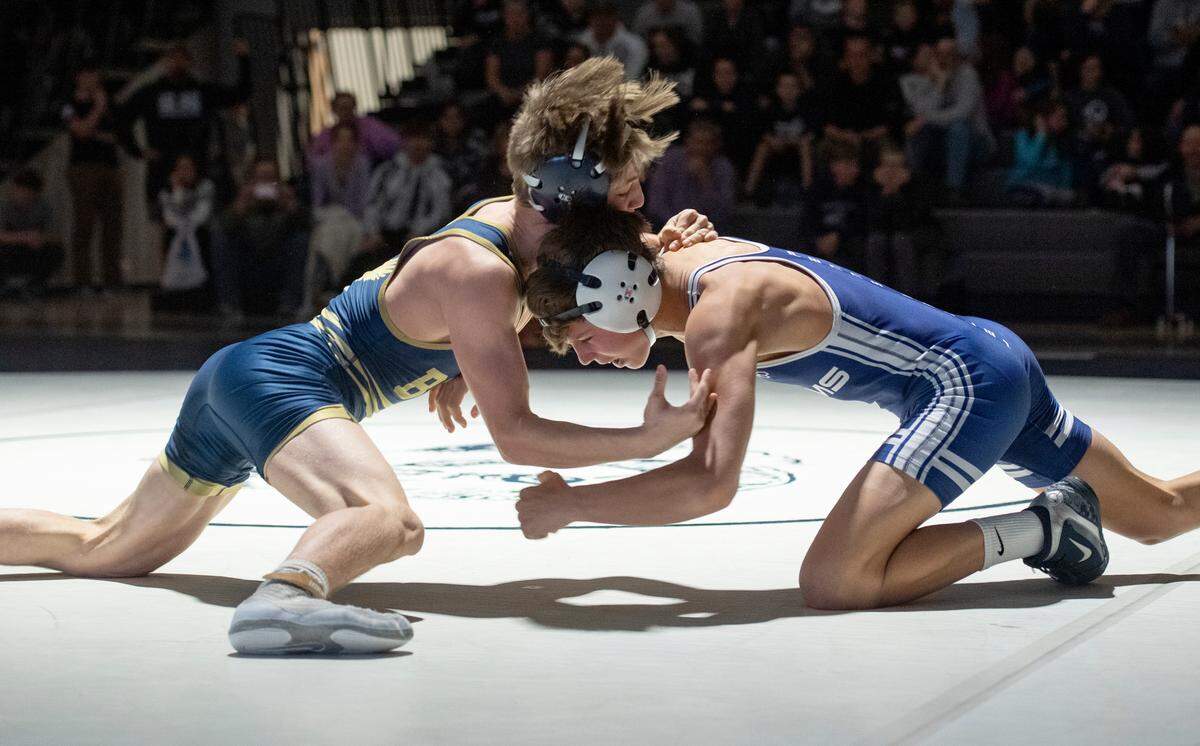 Bald Eagle Area’s Coen Bainey and Penns Valley’s Colten Shunk face off in the 120 lb bout of the match on Wednesday, Jan. 12, 2022.