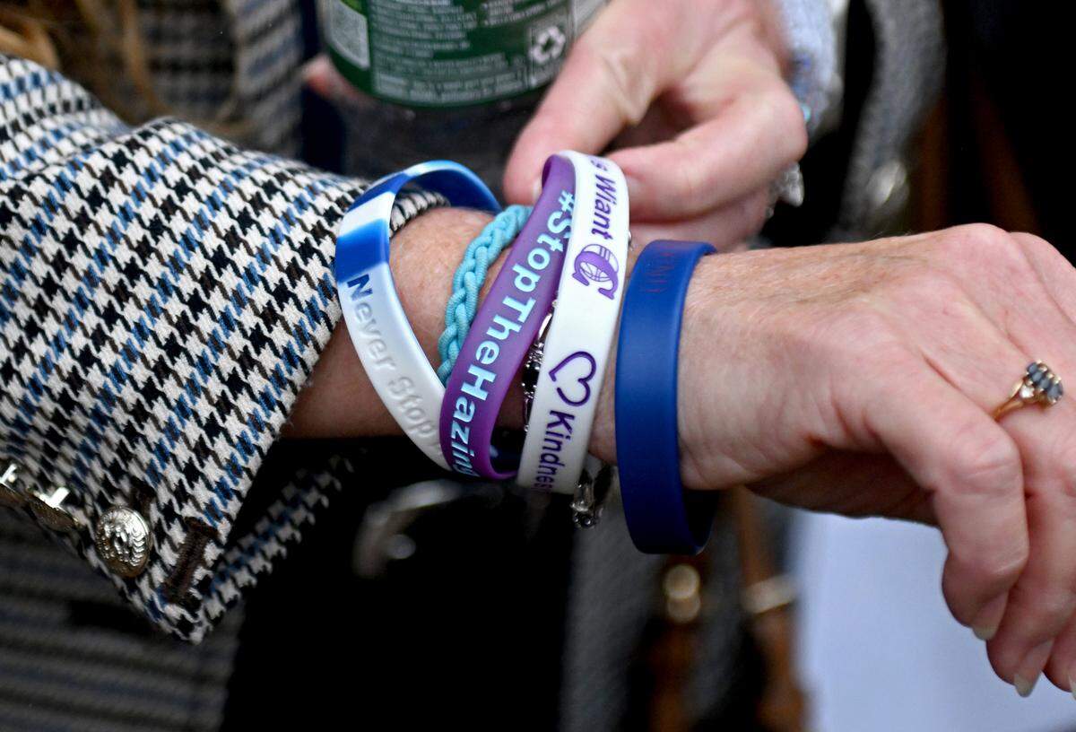 Evelyn Piazza, mother of Timothy Piazza, wears bracelets to remember those who have been involved in hazing incidents as she leaves the Centre County Courthouse Annex on Tuesday, Oct. 1, 2024.